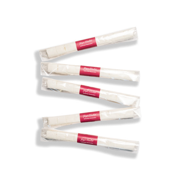 5 marshmallow batons on white background