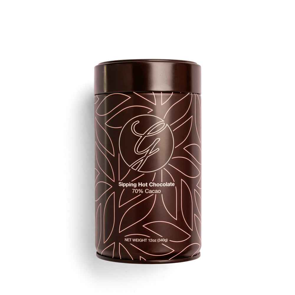 Sipping Hot Chocolate tin on white background