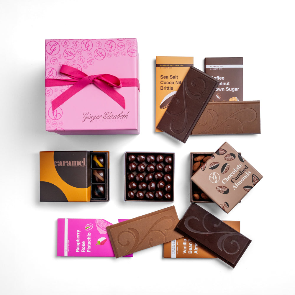 Assorted chocolate bars and confections on a white background